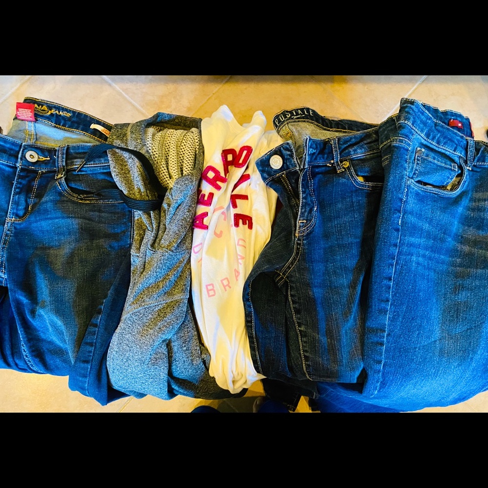 Multiple clothes( Jeans, t shirt, and sweater)